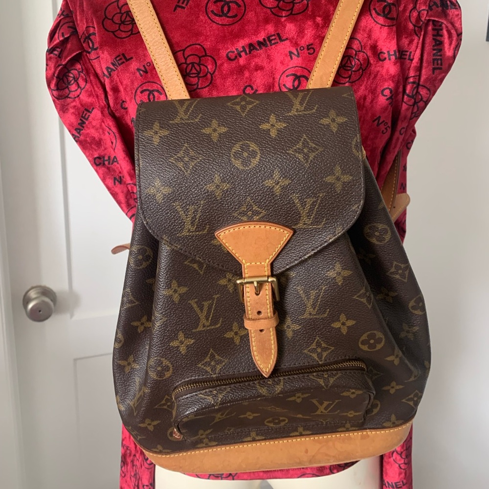 DISCONTINUED Louis Vuitton Montsouris backpack in brown monogram canvas.